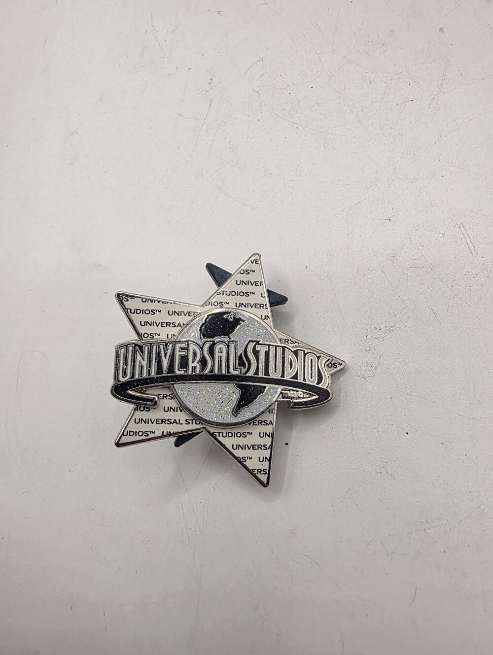 Universal Studios 2000 Logo Star Enamel Lapel Pin Glitter Theme Park Souvenir